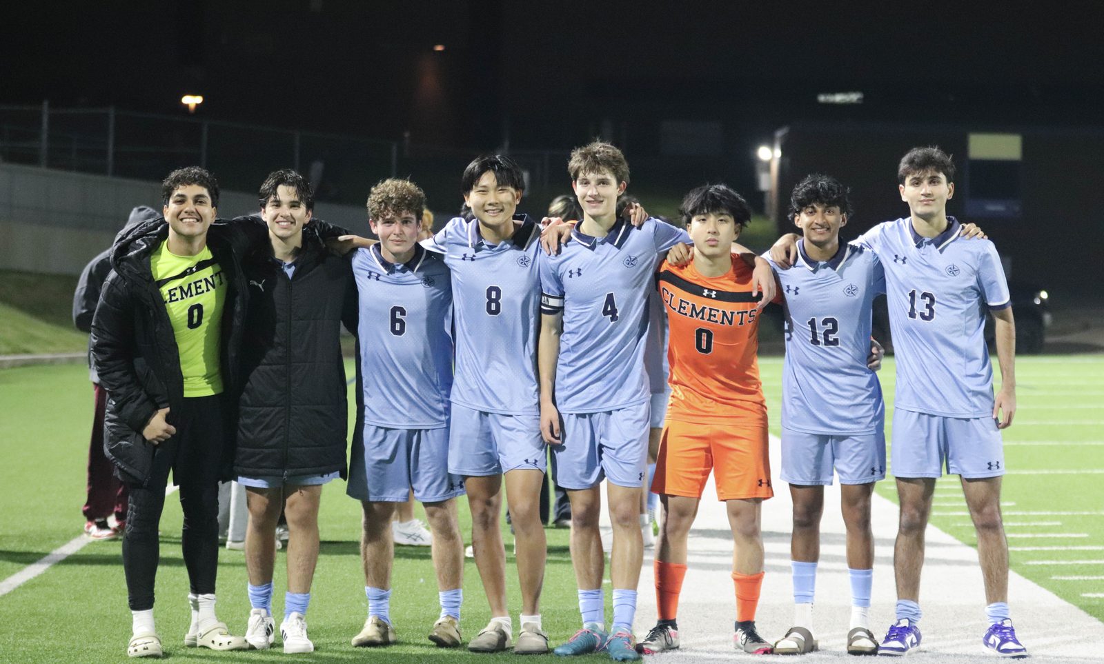 Ali Rad with his soccer teammates after a playoff win